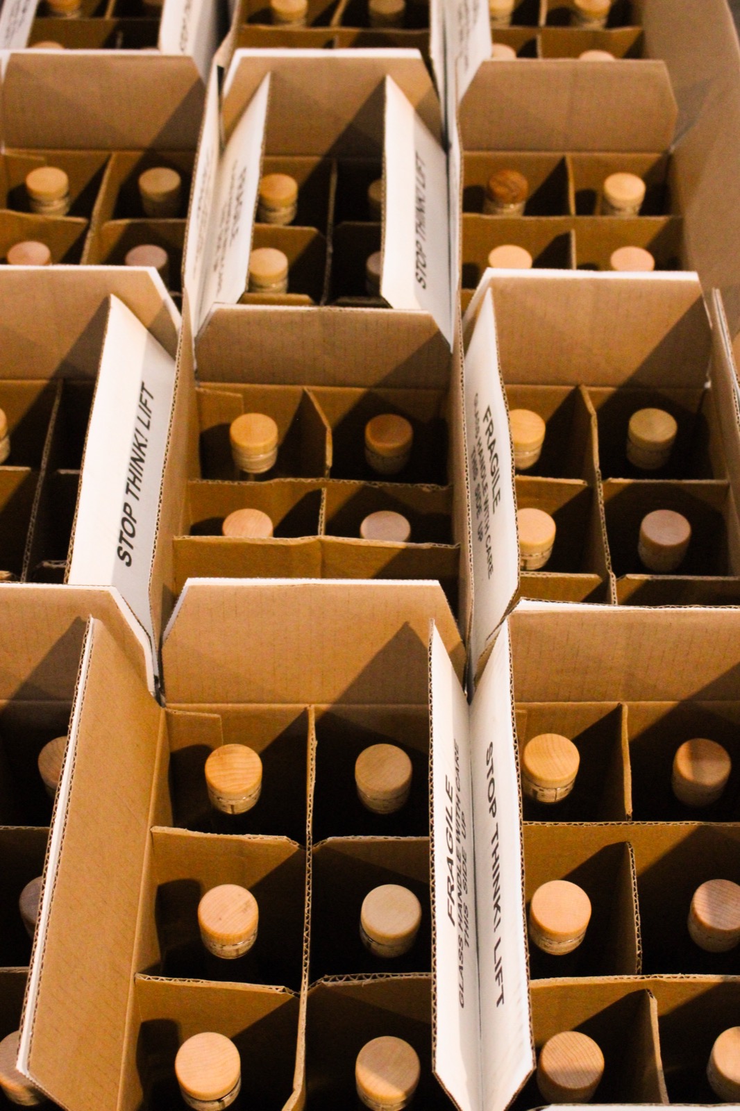 Cases of Girl Dad Bourbon boxed and ready to ship